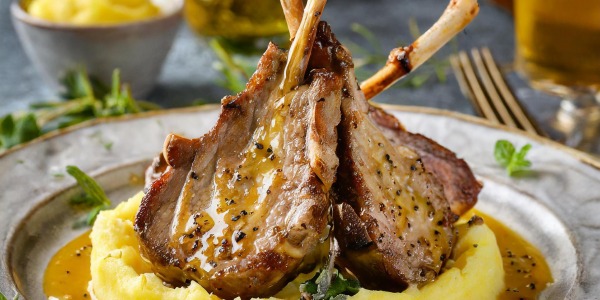 LAMB CHOPS WITH HONEY MUSTARD WITH MASHED POTATOES AND TRUFFLE SHADES